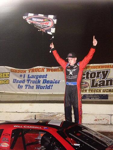 Will Carroll celebrates his Pro Late Model win Saturday night....jpg