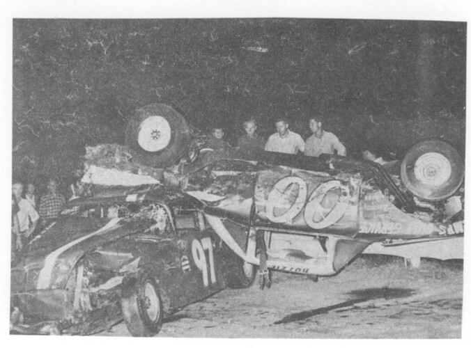 Buzzie Reutimann's car rests on top of Dale Alderman's machine - 1965 (Oscar Norton Photo).jpg
