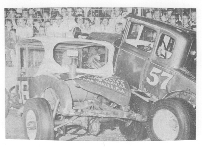 Harvey Breakey's Modified sits on top of J.C. Weaver's car after they tangled at hit the wall - 1965.jpg