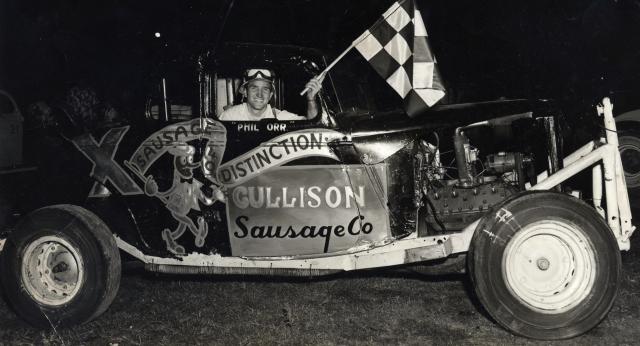 1952 - Phil Orr after a win at Orlando_s Rocket Speedway .jpg