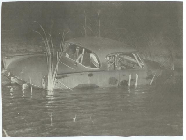 1963 - Dick Skinner took his Studebaker Modern Stock into the infield lake to cool off___.jpg